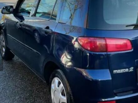 Синій Мазда 2, об'ємом двигуна 1.4 л та пробігом 108 тис. км за 3700 $, фото 1 на Automoto.ua