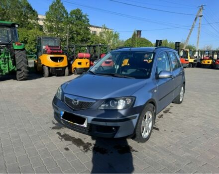 Синий Мазда 2, объемом двигателя 1.4 л и пробегом 135 тыс. км за 1899 $, фото 1 на Automoto.ua