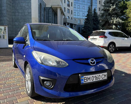 Синий Мазда 2, объемом двигателя 1.5 л и пробегом 154 тыс. км за 6000 $, фото 1 на Automoto.ua