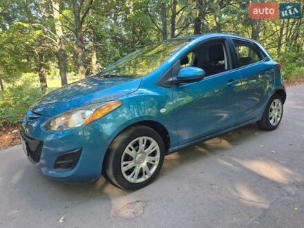 Синий Мазда 2, объемом двигателя 1.5 л и пробегом 82 тыс. км за 7500 $, фото 1 на Automoto.ua