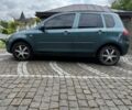 Зелений Мазда 2, об'ємом двигуна 1.4 л та пробігом 138 тис. км за 3800 $, фото 1 на Automoto.ua