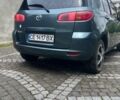 Зеленый Мазда 2, объемом двигателя 1.4 л и пробегом 138 тыс. км за 3800 $, фото 2 на Automoto.ua