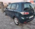 Зелений Мазда 2, об'ємом двигуна 1.3 л та пробігом 175 тис. км за 4600 $, фото 1 на Automoto.ua