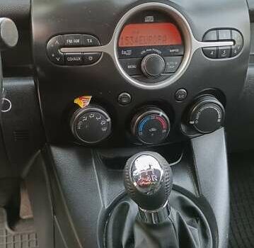 Зеленый Мазда 2, объемом двигателя 1.4 л и пробегом 157 тыс. км за 4590 $, фото 22 на Automoto.ua