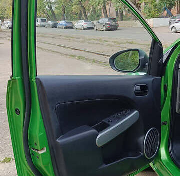 Зеленый Мазда 2, объемом двигателя 1.4 л и пробегом 157 тыс. км за 4590 $, фото 12 на Automoto.ua