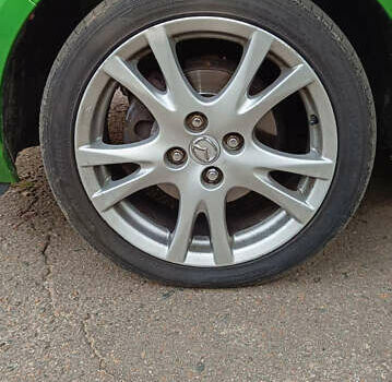 Зеленый Мазда 2, объемом двигателя 1.4 л и пробегом 157 тыс. км за 4590 $, фото 3 на Automoto.ua