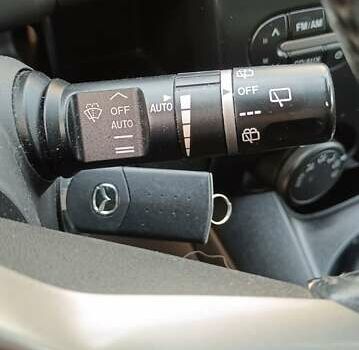 Зеленый Мазда 2, объемом двигателя 1.4 л и пробегом 157 тыс. км за 4590 $, фото 18 на Automoto.ua