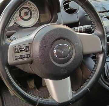 Зеленый Мазда 2, объемом двигателя 1.4 л и пробегом 157 тыс. км за 4590 $, фото 14 на Automoto.ua