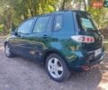 Зеленый Мазда 2, объемом двигателя 1.4 л и пробегом 204 тыс. км за 3800 $, фото 2 на Automoto.ua
