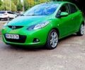 Зеленый Мазда 2, объемом двигателя 1.3 л и пробегом 157 тыс. км за 4990 $, фото 1 на Automoto.ua