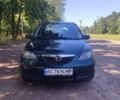 Зеленый Мазда 2, объемом двигателя 1.4 л и пробегом 204 тыс. км за 3800 $, фото 1 на Automoto.ua