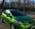 Зелений Мазда 2, об'ємом двигуна 1.5 л та пробігом 183 тис. км за 6200 $, фото 1 на Automoto.ua