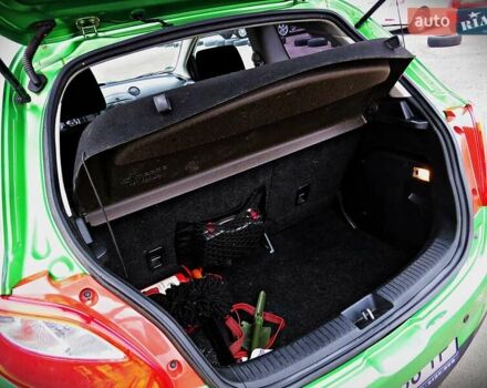 Зелений Мазда 2, об'ємом двигуна 1.4 л та пробігом 169 тис. км за 3700 $, фото 11 на Automoto.ua