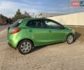 Зеленый Мазда 2, объемом двигателя 1.5 л и пробегом 99 тыс. км за 6000 $, фото 2 на Automoto.ua