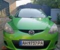 Зелений Мазда 2, об'ємом двигуна 1.3 л та пробігом 174 тис. км за 6000 $, фото 1 на Automoto.ua