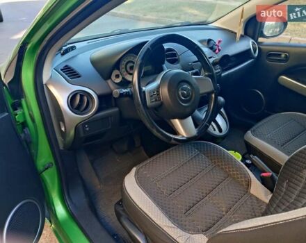 Зеленый Мазда 2, объемом двигателя 1.5 л и пробегом 168 тыс. км за 6600 $, фото 4 на Automoto.ua