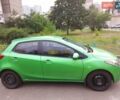 Зеленый Мазда 2, объемом двигателя 1.5 л и пробегом 100 тыс. км за 5000 $, фото 1 на Automoto.ua