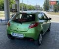 Зелений Мазда 2, об'ємом двигуна 1.5 л та пробігом 88 тис. км за 6800 $, фото 11 на Automoto.ua