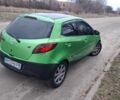 Зеленый Мазда 2, объемом двигателя 1.35 л и пробегом 200 тыс. км за 4000 $, фото 1 на Automoto.ua