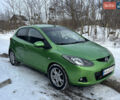 Зелений Мазда 2, об'ємом двигуна 1.5 л та пробігом 107 тис. км за 5850 $, фото 1 на Automoto.ua