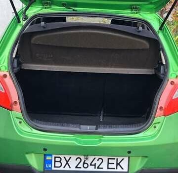 Зелений Мазда 2, об'ємом двигуна 1.5 л та пробігом 69 тис. км за 6300 $, фото 9 на Automoto.ua