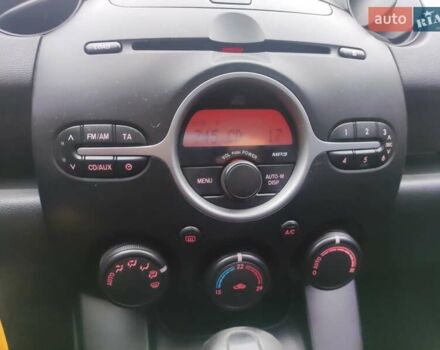 Зеленый Мазда 2, объемом двигателя 1.5 л и пробегом 147 тыс. км за 6000 $, фото 12 на Automoto.ua