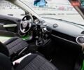 Зелений Мазда 2, об'ємом двигуна 1.4 л та пробігом 169 тис. км за 3700 $, фото 12 на Automoto.ua