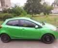 Зелений Мазда 2, об'ємом двигуна 1.5 л та пробігом 100 тис. км за 5000 $, фото 1 на Automoto.ua