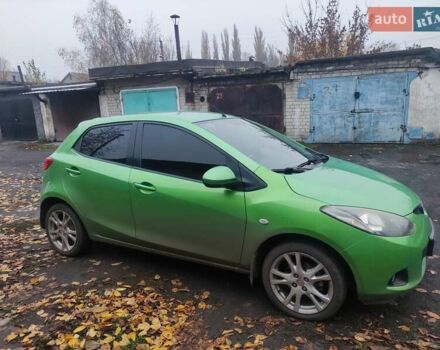 Зеленый Мазда 2, объемом двигателя 1.5 л и пробегом 147 тыс. км за 6000 $, фото 1 на Automoto.ua