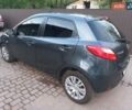 Зелений Мазда 2, об'ємом двигуна 1.4 л та пробігом 181 тис. км за 4800 $, фото 4 на Automoto.ua