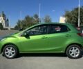 Зелений Мазда 2, об'ємом двигуна 1.3 л та пробігом 204 тис. км за 4600 $, фото 6 на Automoto.ua