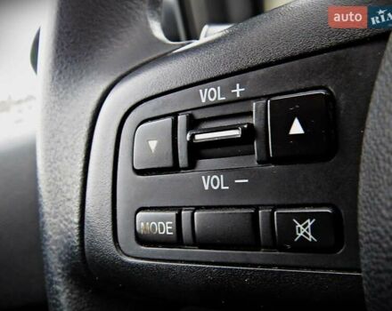 Зелений Мазда 2, об'ємом двигуна 1.4 л та пробігом 169 тис. км за 3700 $, фото 6 на Automoto.ua