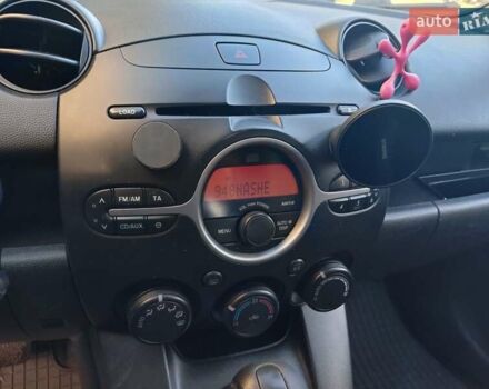 Зеленый Мазда 2, объемом двигателя 1.5 л и пробегом 168 тыс. км за 6600 $, фото 2 на Automoto.ua