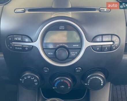 Зелений Мазда 2, об'ємом двигуна 1.5 л та пробігом 88 тис. км за 6800 $, фото 28 на Automoto.ua