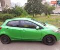 Зелений Мазда 2, об'ємом двигуна 1.5 л та пробігом 100 тис. км за 6200 $, фото 1 на Automoto.ua