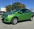 Зелений Мазда 2, об'ємом двигуна 1.3 л та пробігом 204 тис. км за 4600 $, фото 1 на Automoto.ua