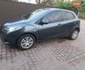 Зелений Мазда 2, об'ємом двигуна 1.4 л та пробігом 181 тис. км за 4800 $, фото 2 на Automoto.ua