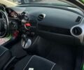 Зеленый Мазда 2, объемом двигателя 1.5 л и пробегом 135 тыс. км за 6000 $, фото 20 на Automoto.ua