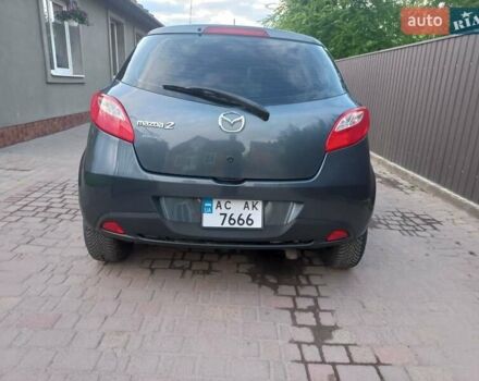 Зелений Мазда 2, об'ємом двигуна 1.4 л та пробігом 181 тис. км за 4800 $, фото 6 на Automoto.ua