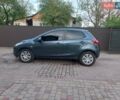 Зелений Мазда 2, об'ємом двигуна 1.4 л та пробігом 181 тис. км за 4800 $, фото 3 на Automoto.ua