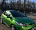 Зеленый Мазда 2, объемом двигателя 1.5 л и пробегом 183 тыс. км за 6000 $, фото 1 на Automoto.ua