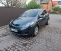 Зелений Мазда 2, об'ємом двигуна 1.4 л та пробігом 181 тис. км за 4800 $, фото 1 на Automoto.ua