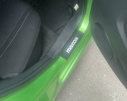 Мазда 2 2009 в Белой Церкве на Automoto.ua Зеленый Мазда 2, объемом двигателя 1.6 л и пробегом 169 тыс. км за 5700 $, фото 4 на Automoto.ua