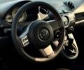 Зелений Мазда 2, об'ємом двигуна 1.35 л та пробігом 239 тис. км за 4600 $, фото 5 на Automoto.ua