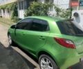 Зелений Мазда 2, об'ємом двигуна 1.5 л та пробігом 200 тис. км за 7100 $, фото 2 на Automoto.ua