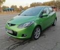 Зелений Мазда 2, об'ємом двигуна 1.5 л та пробігом 102 тис. км за 6800 $, фото 1 на Automoto.ua