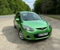 Зеленый Мазда 2, объемом двигателя 1.35 л и пробегом 237 тыс. км за 5700 $, фото 1 на Automoto.ua