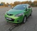 Зелений Мазда 2, об'ємом двигуна 1.5 л та пробігом 102 тис. км за 6800 $, фото 1 на Automoto.ua
