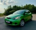 Зелений Мазда 2, об'ємом двигуна 1.35 л та пробігом 239 тис. км за 4600 $, фото 1 на Automoto.ua