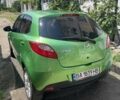 Зелений Мазда 2, об'ємом двигуна 1.5 л та пробігом 200 тис. км за 7100 $, фото 1 на Automoto.ua